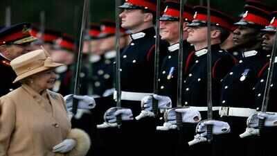 When Queen Elizabeth II smiled at Prince Harry, his reaction said everything