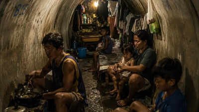 Shocking reality of 100 families living beneath Manila highways in the Philippines | World News