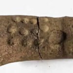 11 mysterious dots on a 2,700-year-old figurine are forcing archaeologists to rethink early writing in Guatemala | World News