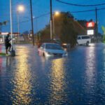 Tropical storm remnants drench Gulf states after tornadoes hit the Midwest