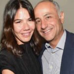 Libbie Mugrabi, ex-wife of billionaire art dealer David Mugrabi, listed her Hamptons mansion for  million and later cut the price to  million; its court-ordered auction will start at  million