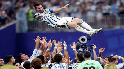 Watch: Tearful Lionel Messi lifted aloft as Argentina’s locker room and Buenos Aires erupt after epic World Cup escape | Football News