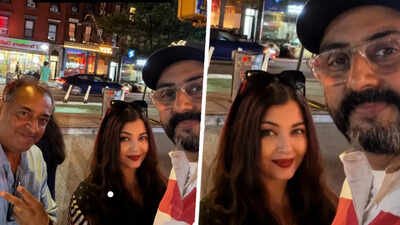 Abhishek Bachchan and Aishwarya Rai Bachchan spotted together in New York; pose with fan for a selfie |