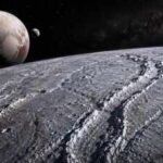 Pluto’s moon Charon may have once spun once every 14 hours, and its ancient mountains still record how it slowed down |