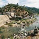 This California river once carried thousands of salmon every year. A 1942 dam changed it forever, and scientists are still trying to bring them back | World News
