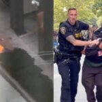 Watch: US army veteran carrying ‘ICE off our streets’ sign sets fire outside NYC federal building