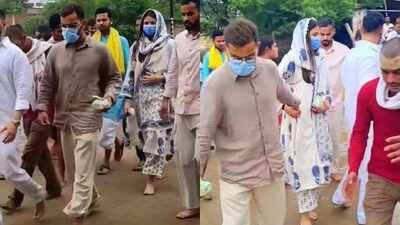 Virat Kohli, Anushka Sharma spotted barefoot in Vrindavan after visiting Premanand Ji Maharaj on Wednesday, videos go viral on the internet – WATCH |