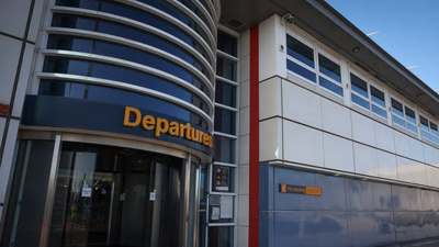 Kevin Smith paid £5 after dropping off his son and another £5 when collecting him; East Midlands Airport still sent two £100 fines