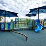 A former Illinois elementary school closed in 2014; its site has now become a .35 million fully accessible park with an inclusive playground, walking paths and a new splash pad