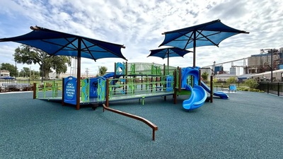 A former Illinois elementary school closed in 2014; its site has now become a .35 million fully accessible park with an inclusive playground, walking paths and a new splash pad