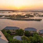 A Louisiana businessman built a house on floating barges so it could be towed into open water for duck season; the 22-person property is now asking .5 million |