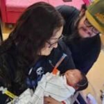 An Arizona baby stopped breathing during a post-office visit; former nurse Mary Schwarz performed CPR and helped restore her breathing on the way to hospital