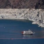 Lake Mead fell to 1,040.4 feet as the Colorado River crisis deepened; Lake Powell is also under pressure, raising questions over water and hydropower