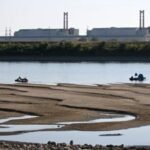 Hungary shut its only nuclear plant for the first time in 44 years after the Danube fell too low to cool its reactors; nearly half its electricity supply is now affected