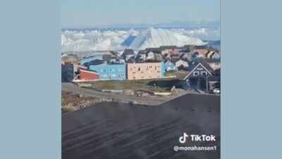 A livestream from Greenland’s UNESCO-listed Ilulissat Icefjord captured a mammoth iceberg rolling over and exposing its blue underside