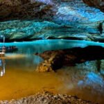 In 1905, a 13-year-old crawled through a tiny Tennessee cave passage and found a hidden underground lake