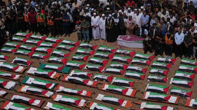 Gaza mass funeral for 112 Palestinians, including dozens of children, recovered from 2023 strike