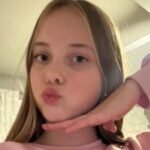 Michigan children set up a lemonade stand after 13-year-old cheerleader Lainey Scroggs died; it raised over ,000 as her family fundraiser reached nearly ,000