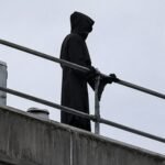 Man dressed as ‘Grim Reaper’ climbs onto hospital roof with long blade, apparently trying to scare patients | World News