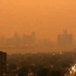 Michigan’s AQI hit 616 after Ontario wildfire smoke crossed into the US; scientists warn a warming climate could make such pollution more common