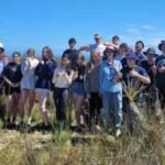 In 1997, a New Zealand teacher began planting a windswept coastal paddock with Year 9 students; 29 years later, 12,425 plants have turned it into native habitat