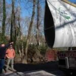 Atlanta reused a nearly 7,000-pound wind turbine blade as a 50-foot pedestrian bridge; the retired Colorado blade now carries walkers through Beaverbrook Park