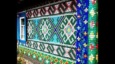 A Russian pensioner covered her Siberian home with 30,000 colourful bottle caps; the unusual recycling project turned a wooden house into a giant work of art