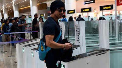 Shah Rukh Khan SPOTTED at London airport; sparks frenzy at immigration counter – WATCH |
