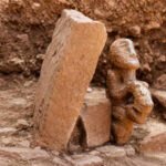 a unique 11,000-year-old statue of a human sitting on a leopard was unearthed at karahantepe | World News