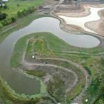 Texas turned an abandoned golf course into a 200-acre flood-control landscape; while still unfinished during Hurricane Harvey it held 100 million gallons of water