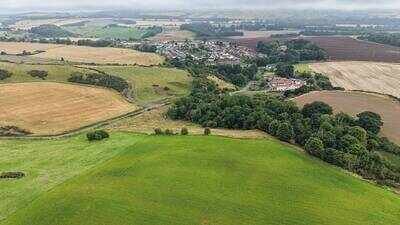 Tiny Scottish village of 200 homes in Auchtertool, Fife, fights plans for world’s second-largest data centre covering more than 100 football pitches; 1,600 objections pile up, residents fear it could dwarf their community