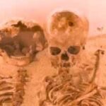 12,000-year-old skeletons buried in an embrace in Italy were women, with ancient DNA revealing a mother-daughter link and rare genetic disease | World News