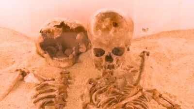 12,000-year-old skeletons buried in an embrace in Italy were women, with ancient DNA revealing a mother-daughter link and rare genetic disease | World News