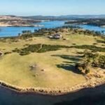 In 2002, an Australian couple bought a barren 26-hectare island; 17 years later, they moved in after clearing weeds and hauling 38 truckloads of materials | World News
