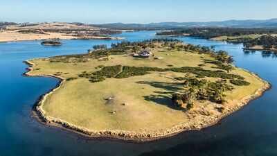 In 2002, an Australian couple bought a barren 26-hectare island; 17 years later, they moved in after clearing weeds and hauling 38 truckloads of materials | World News