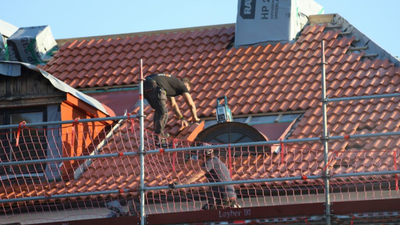 In 1997, Texas mixed discarded roofing shingles into two 1,000-foot Highway 31 test sections; years later, officials said their performance was comparable to conventional asphalt