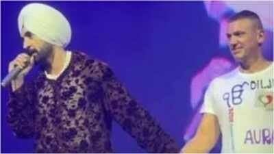 Diljit Dosanjh gently corrects fan over ‘IK ONKAR’ t-shirt at Milan concert; wins hearts online |