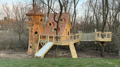 A US grandfather planned a $100,000-$150,000 treehouse for his grandkids; it grew into a $325,000 backyard castle with a pirate ship and 200-foot zipline
