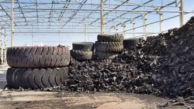 In 2000, California packed 662,700 shredded waste tires beneath an I-880 on-ramp; they cut foundation stress 40%, saved $477,000, and CalRecycle later reported 22 years without repairs or issues