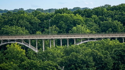 A Cleveland bridge opened in 1933 and was being designed for a 2028 rehabilitation; new analysis found deeper floor-beam deterioration, forcing officials to close the 93-year-old bridge immediately