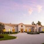 A California woman built a 10,363-sq-ft French-style mansion with centuries-old materials sourced from around the world; no one has lived in it, and it is now asking M