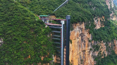 Children in China’s Nizhuhe village trekked three hours up and down an 800 metre cliff to go to school; now two elevators and a cable car ride have reduced the journey to half hour
