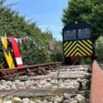 A retired UK rail engineer turned his East Sussex garden into a working railway using a Victorian platelayer’s trolley; the line now runs 50 feet and uses a 12-volt battery charged by solar power