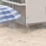 Watch: Flash floods in China destroys 3-storey building in an instant; 2500 stranded inside school