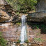 An Illinois waterfall and canyon photographed as a tourist attraction in 1903 remained largely closed to the public for generations; its corporate owner has now donated more than 50 acres so it can become a public park