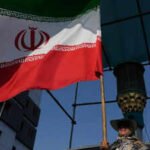 Iran doubles petrol price for heavy users as currency touches record low