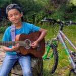 Meet Adrian Abraham, 9-year-old Indian-origin rock and metal guitarist aiming to set a world record by attempting the Grade 8 electric guitar exam