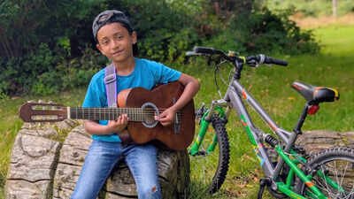Meet Adrian Abraham, 9-year-old Indian-origin rock and metal guitarist aiming to set a world record by attempting the Grade 8 electric guitar exam