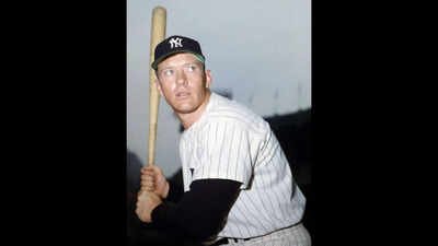 A couple found a rare Mickey Mantle photo inside a baseball book at a garage sale; it later sold for $20,740 | World News