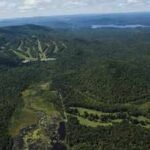 Developers once planned Adirondack Park’s largest residential project on 5,800 New York acres; after years of failure and foreclosure litigation, the land is headed for public auction